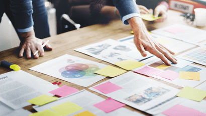 Strategy documents spread on a desk